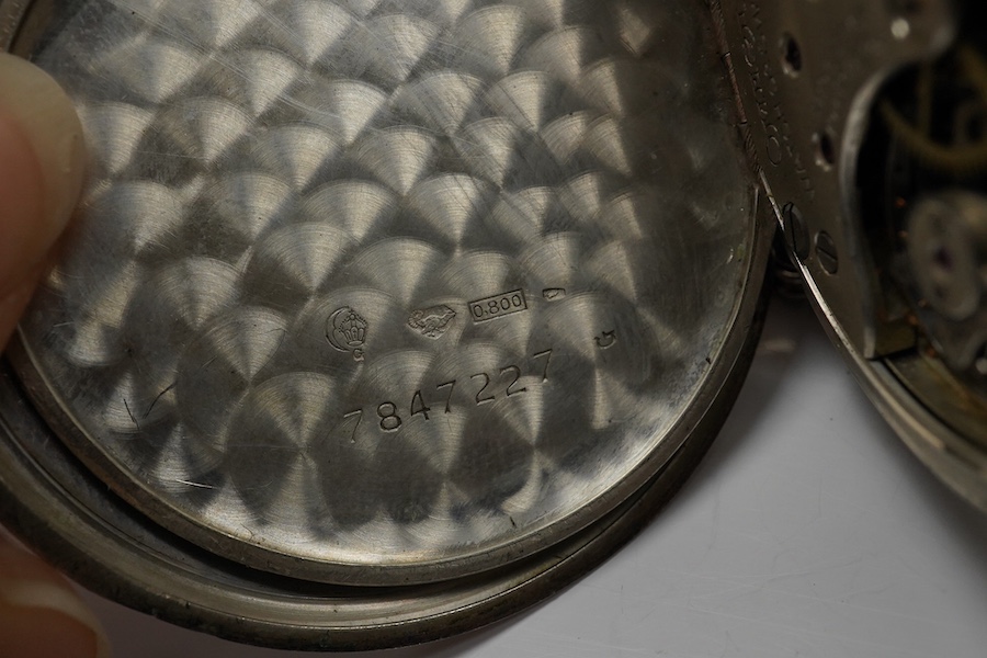 An 800 standard white metal Omega open faced keyless pocket watch, with Arabic dial and subsidiary seconds, case diameter 48mm, together with a white metal albertina. Condition - poor